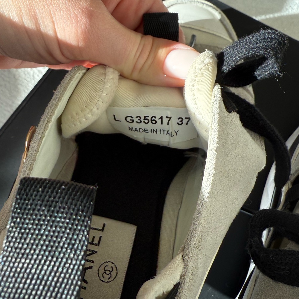 CHANEL Classic Sneakers in Ivory/White
Calfskin Suede + Gold Chanel Logo - Picture 9 of 9